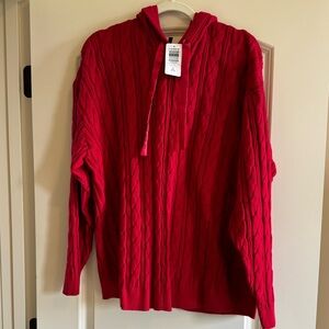 Torrid red cable knit hoodie sweater with red satin pull string.